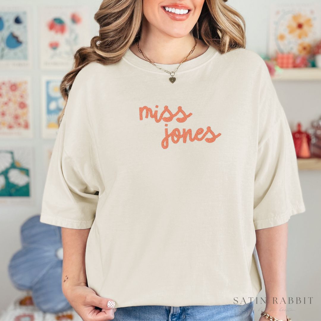 custom cursive embroidered tee (solid/two-tone text)